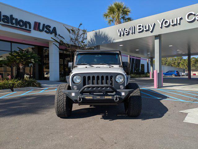 used 2015 Jeep Wrangler Unlimited car, priced at $16,551