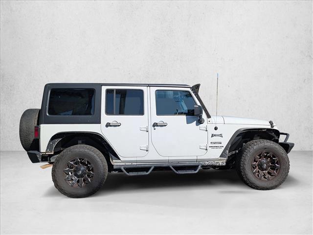 used 2015 Jeep Wrangler Unlimited car, priced at $16,551