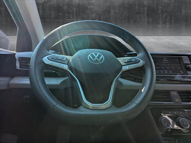 used 2024 Volkswagen Taos car, priced at $23,050