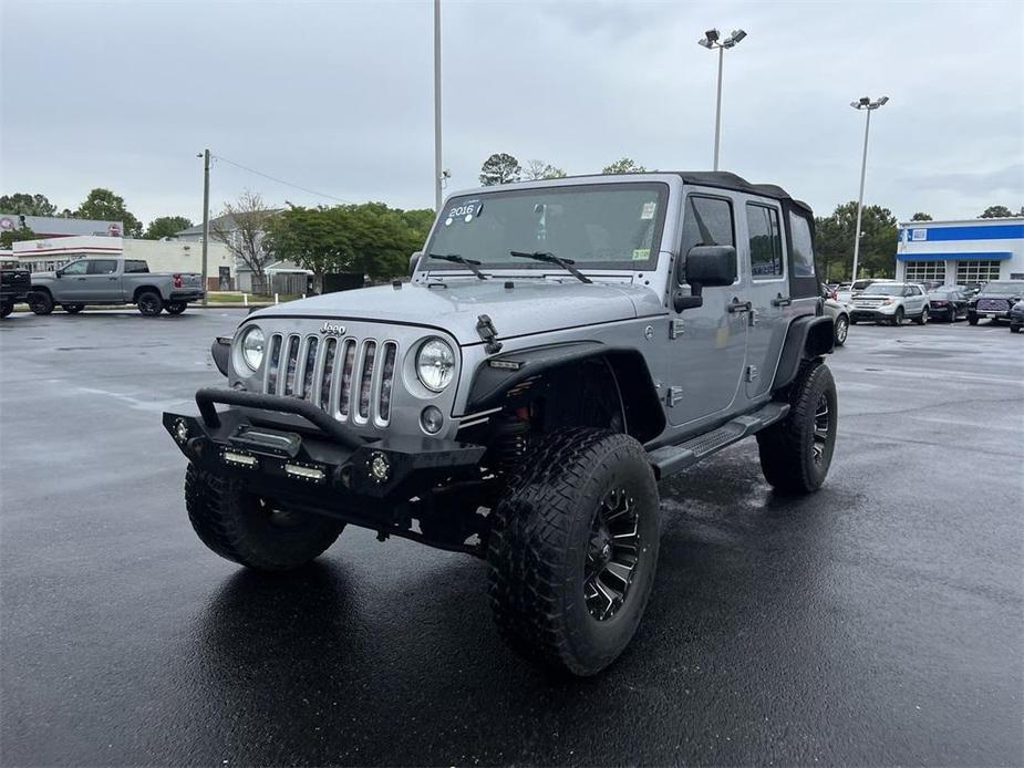 used 2016 Jeep Wrangler Unlimited car, priced at $24,396
