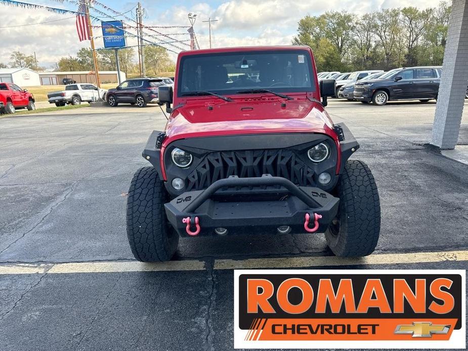 used 2014 Jeep Wrangler Unlimited car, priced at $16,999