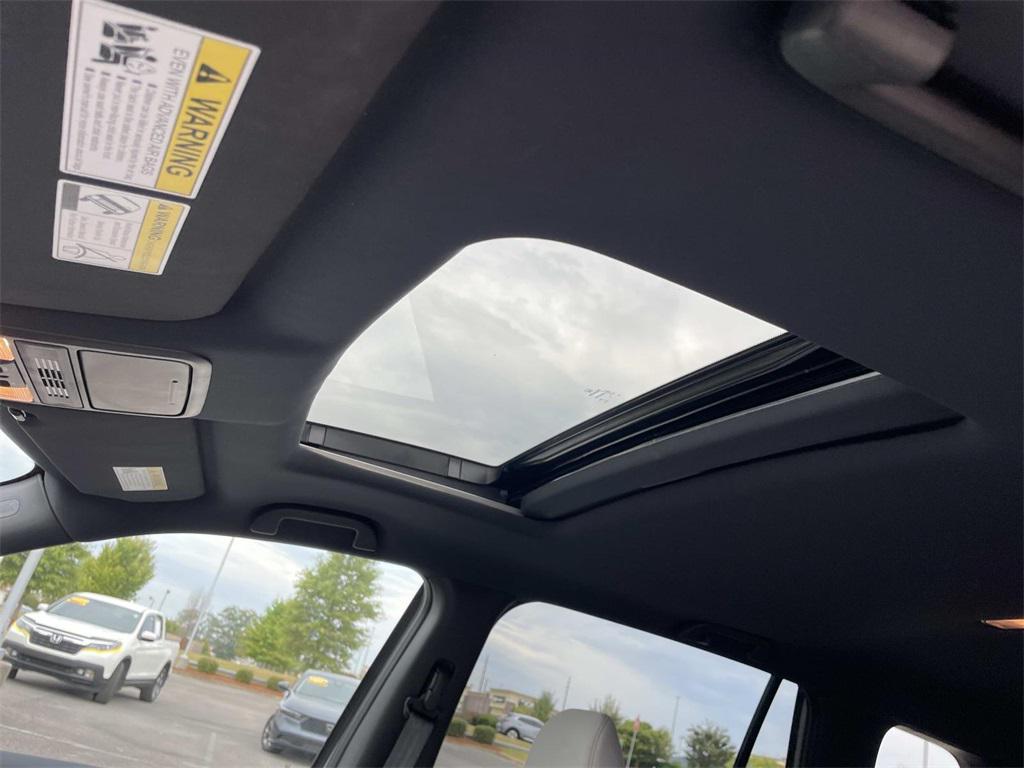 used 2023 Honda Passport car, priced at $35,150