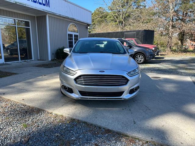 used 2014 Ford Fusion car, priced at $7,995