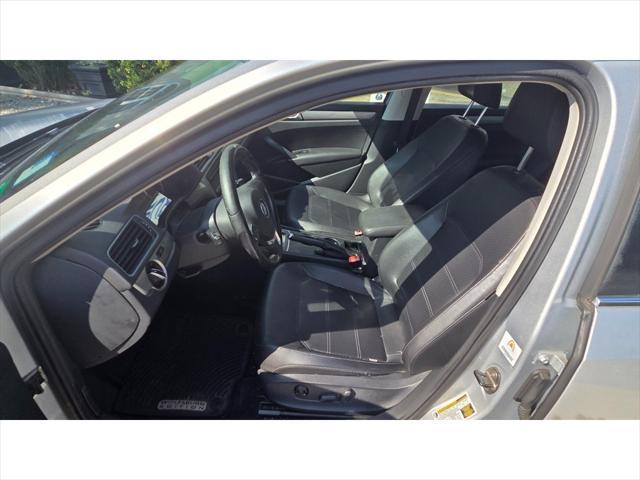 used 2014 Volkswagen Passat car, priced at $7,995
