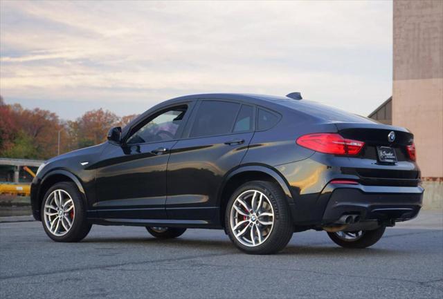 used 2016 BMW X4 car, priced at $19,900