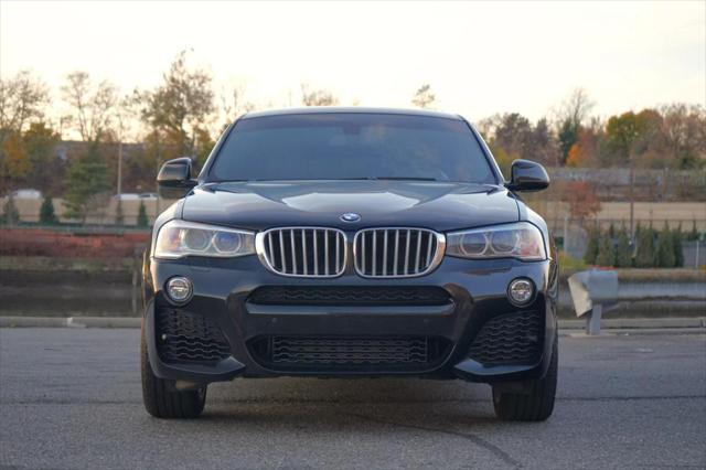 used 2016 BMW X4 car, priced at $19,900