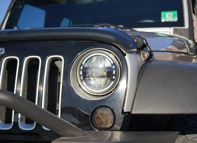 used 2012 Jeep Wrangler Unlimited car, priced at $10,500