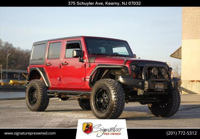 used 2012 Jeep Wrangler Unlimited car, priced at $17,200