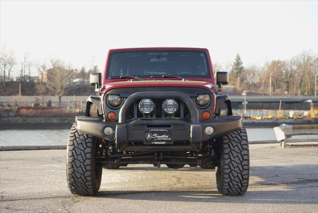 used 2012 Jeep Wrangler Unlimited car, priced at $17,200