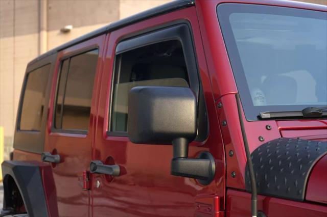 used 2012 Jeep Wrangler Unlimited car, priced at $17,200