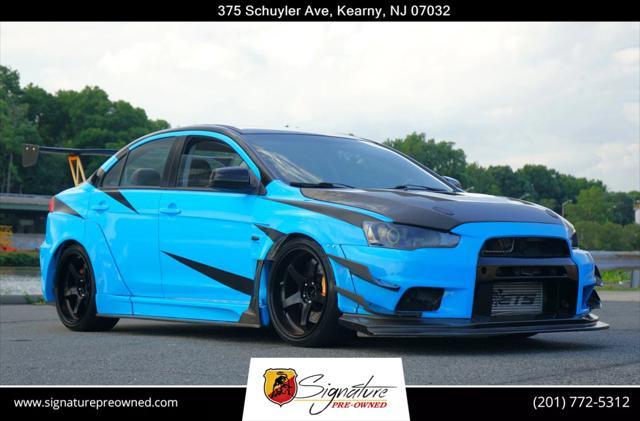 used 2012 Mitsubishi Lancer Evolution car, priced at $29,900