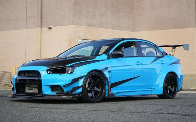 used 2012 Mitsubishi Lancer Evolution car, priced at $29,900