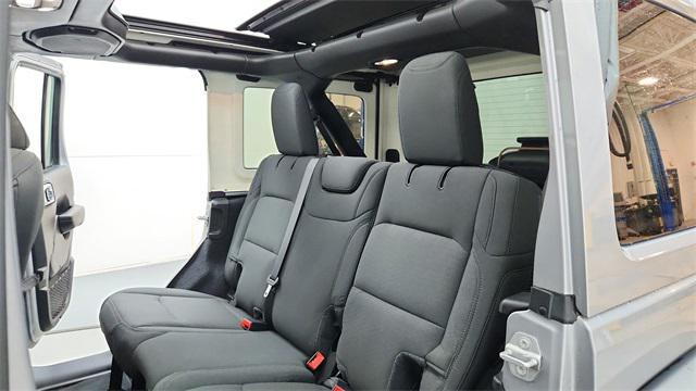 used 2021 Jeep Wrangler Unlimited car, priced at $29,757