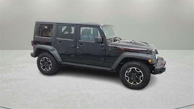 used 2016 Jeep Wrangler Unlimited car, priced at $25,475