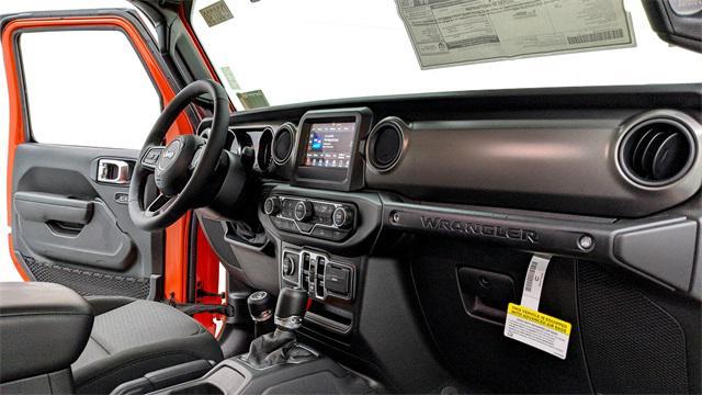 used 2023 Jeep Wrangler car, priced at $39,285