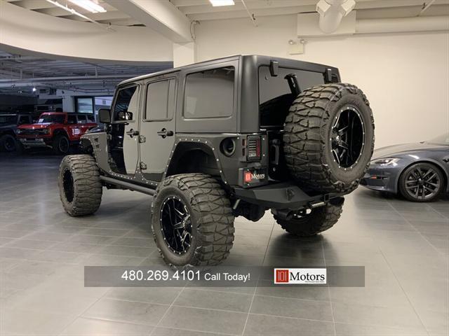 used 2015 Jeep Wrangler Unlimited car, priced at $57,901