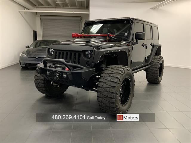 used 2015 Jeep Wrangler Unlimited car, priced at $57,901