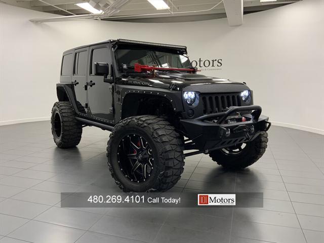 used 2015 Jeep Wrangler Unlimited car, priced at $57,901