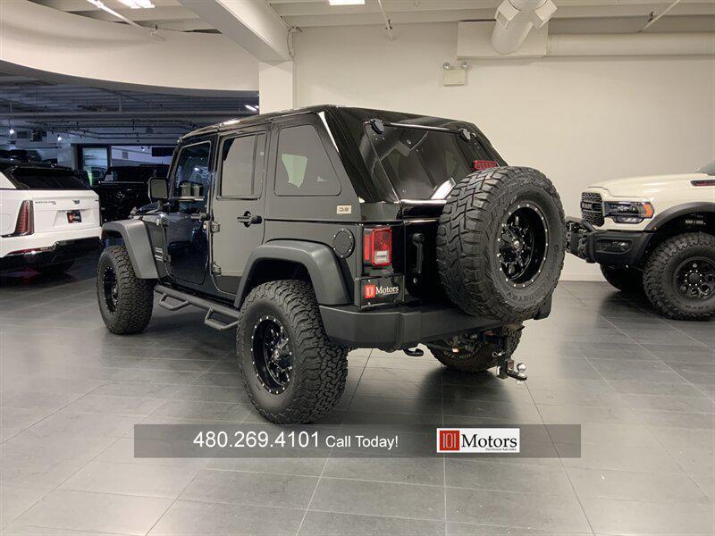 used 2015 Jeep Wrangler Unlimited car, priced at $19,901