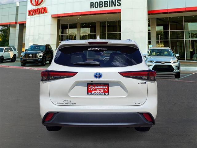 used 2021 Toyota Highlander Hybrid car, priced at $28,775