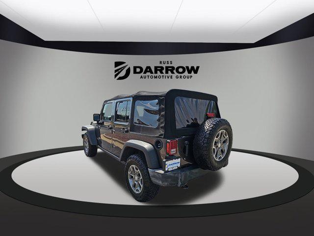 used 2017 Jeep Wrangler Unlimited car, priced at $24,140