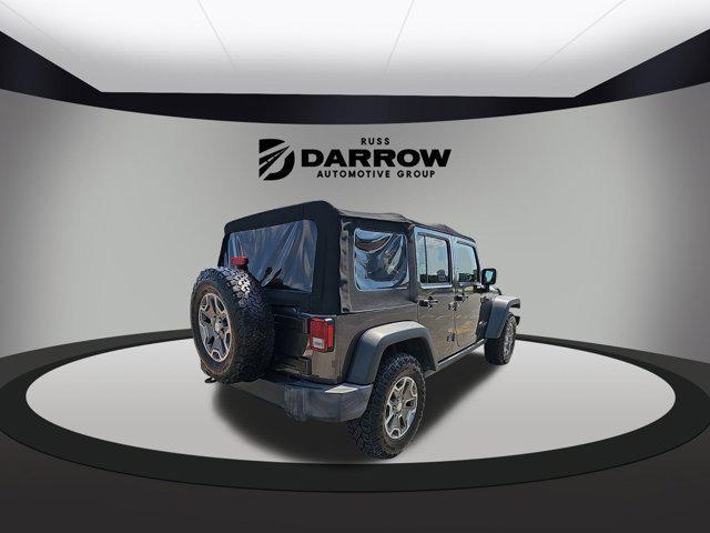 used 2017 Jeep Wrangler Unlimited car, priced at $24,140