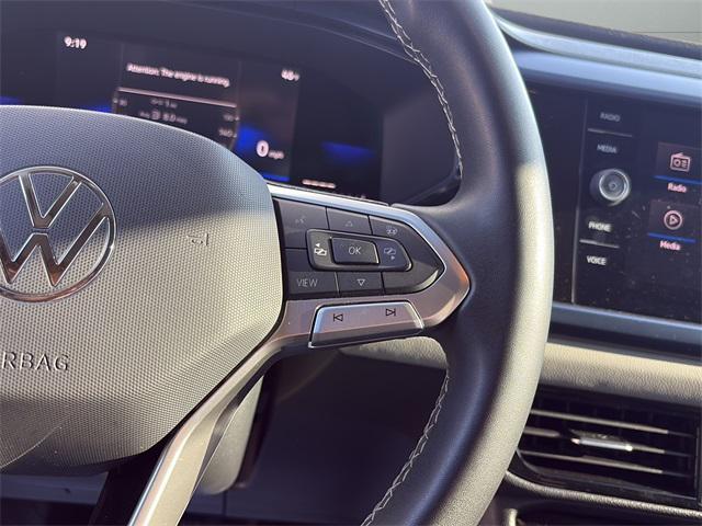 used 2023 Volkswagen Taos car, priced at $18,200