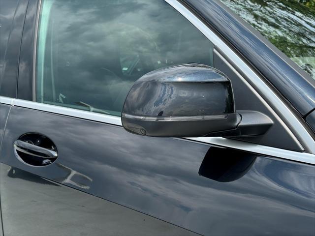 used 2025 BMW X5 car, priced at $52,800