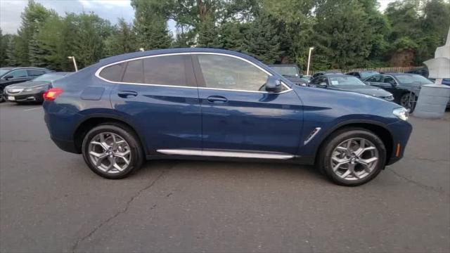 used 2023 BMW X4 car, priced at $55,499