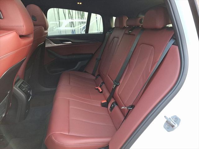 used 2023 BMW X4 car, priced at $51,999