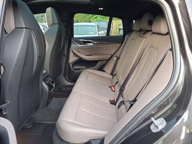 used 2022 BMW X4 M car, priced at $63,999
