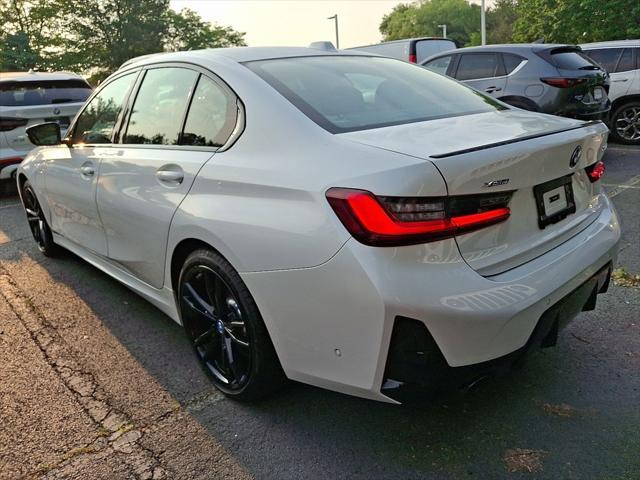 used 2024 BMW 330e car, priced at $44,699