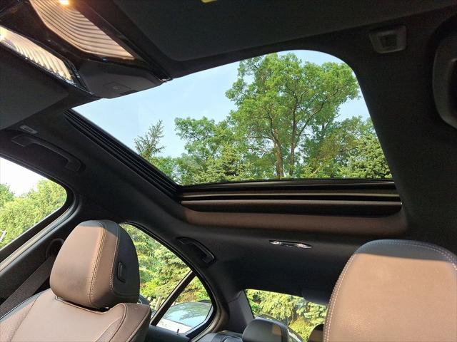 used 2024 BMW 330e car, priced at $44,699