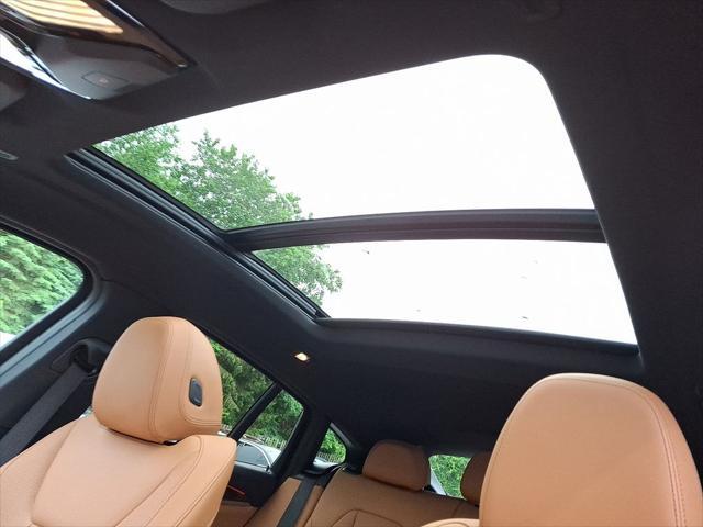 used 2025 BMW X4 car, priced at $52,999