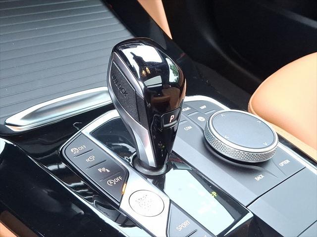 used 2025 BMW X4 car, priced at $52,999