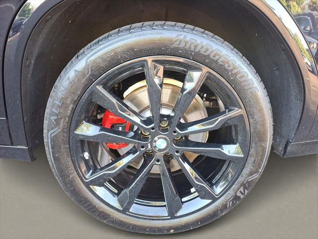 used 2024 BMW X4 car, priced at $61,499