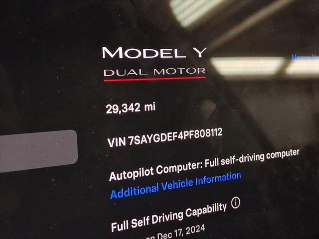 used 2023 Tesla Model Y car, priced at $33,899