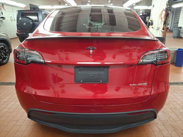 used 2023 Tesla Model Y car, priced at $33,899