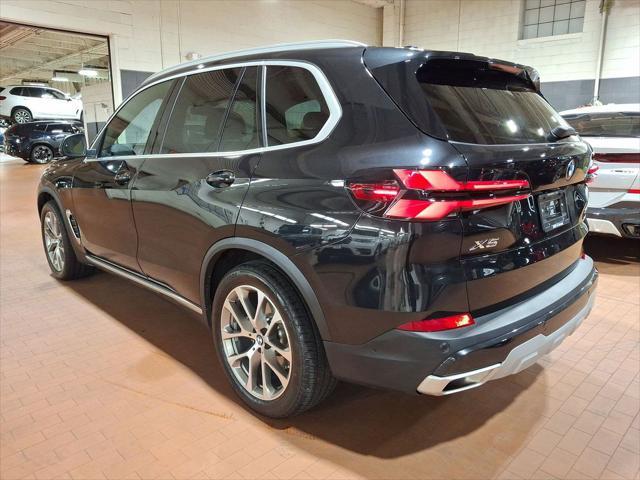 used 2025 BMW X5 car, priced at $60,899