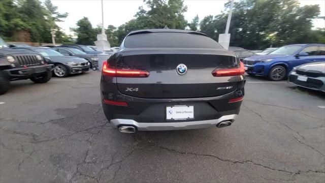 used 2024 BMW X4 car, priced at $58,799