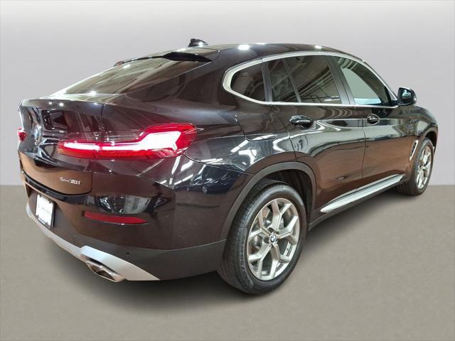 used 2025 BMW X4 car, priced at $52,999