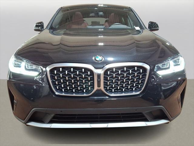 used 2025 BMW X4 car, priced at $52,999