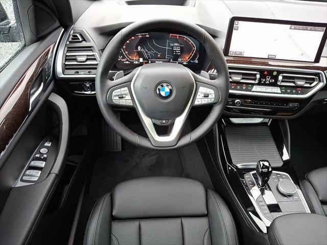 used 2025 BMW X4 car, priced at $53,299