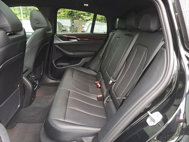 used 2025 BMW X4 car, priced at $53,299