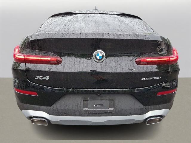 used 2025 BMW X4 car, priced at $53,299