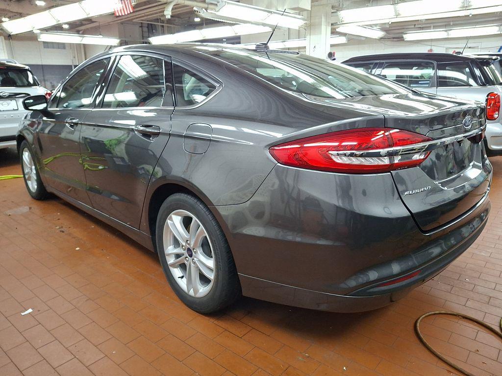 used 2018 Ford Fusion car, priced at $10,299