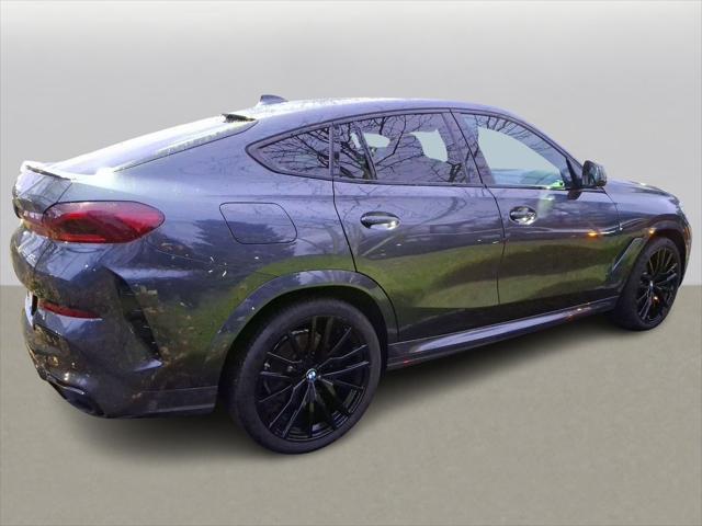 used 2022 BMW X6 car, priced at $52,999