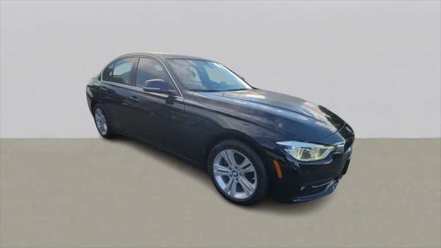 used 2018 BMW 330 car, priced at $19,698