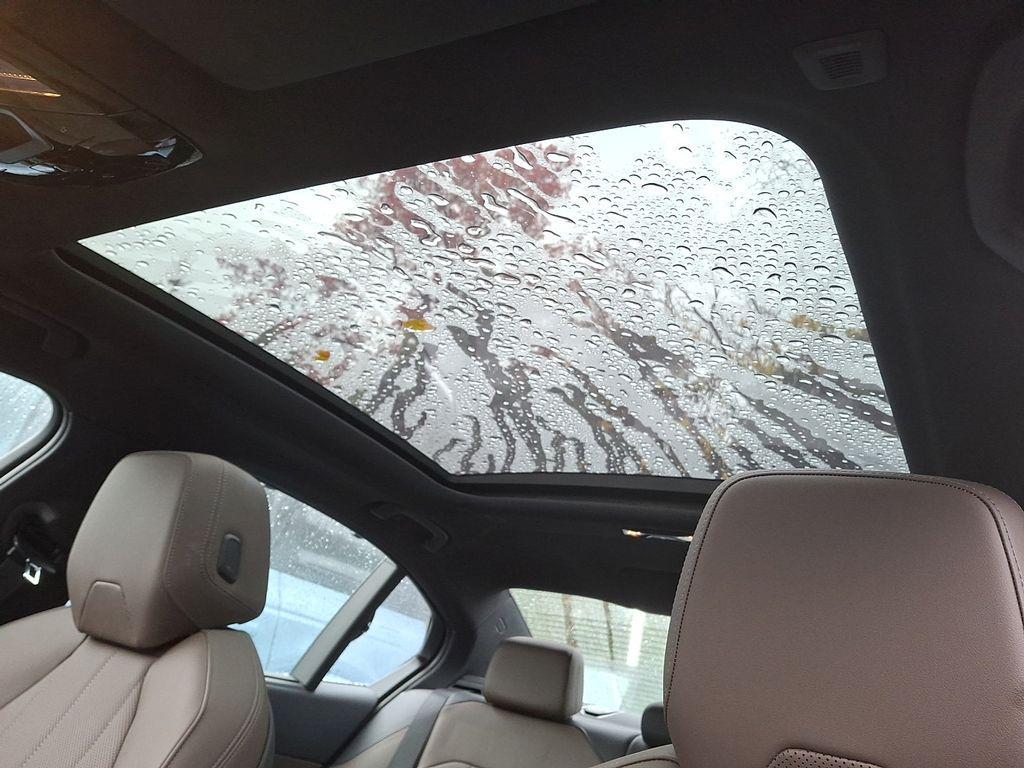 used 2025 BMW i5 car, priced at $65,999