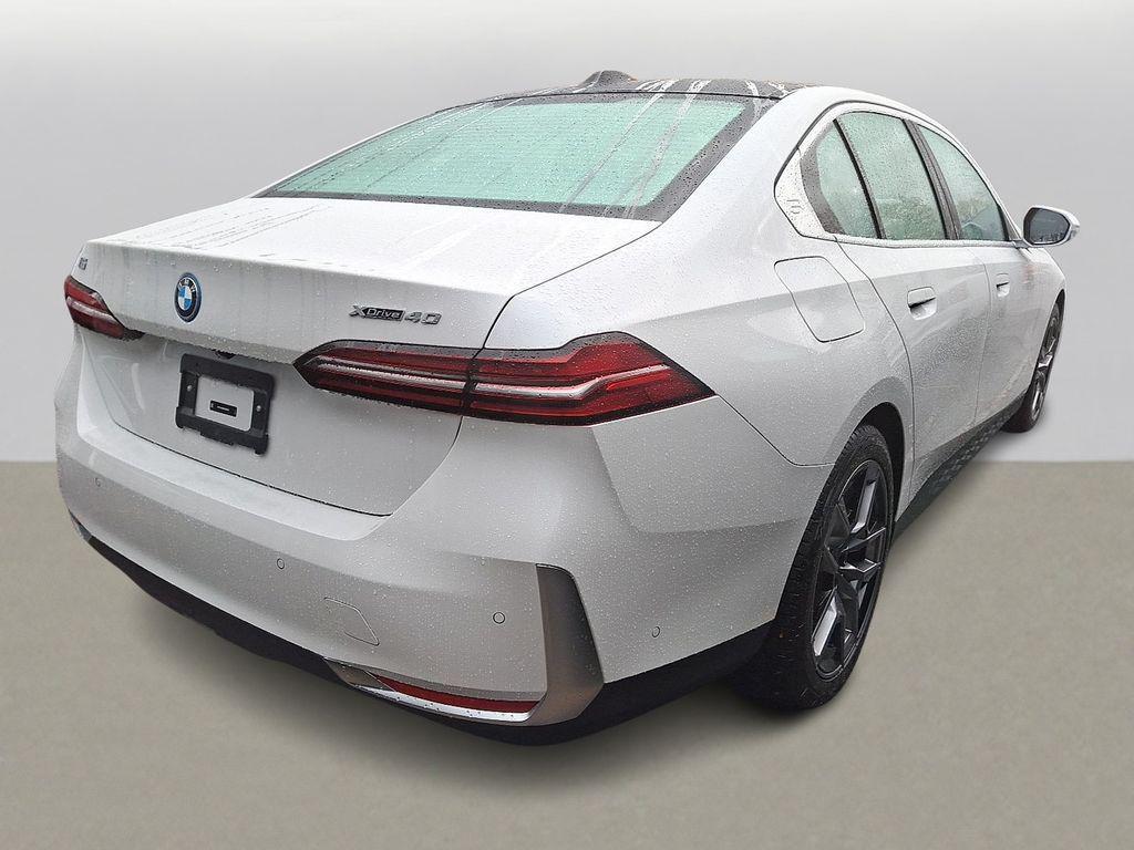 used 2025 BMW i5 car, priced at $65,999